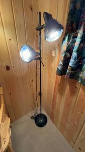 lot 16 image: Adjustable Dual-Head Floor Lamp with Black Base
