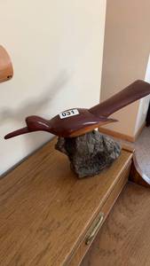 lot 31 image: Handcrafted Wooden Bird Sculpture on Natural Base