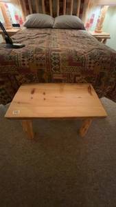 lot 152 image: Rustic Wooden Bench with Log Legs