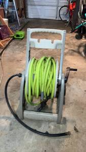 lot 196 image: Garden Hose Reel with 100 ft Green Hose