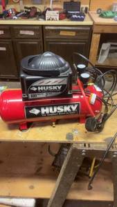 lot 223 image: Husky 2 Gallon Portable Air Compressor with 100 PSI Maximum Pressure