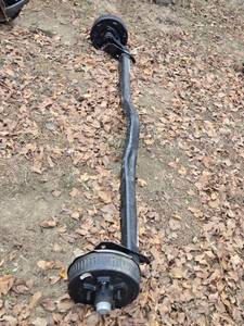 lot 31 image: Trailer Axle Assembly with Electric Brakes Outside Brackets Approx. 74