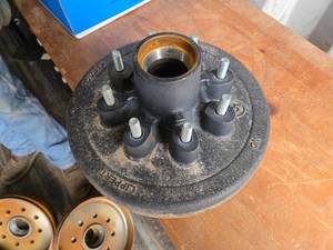 lot 46 image: New  12-inch Cast Iron Lippert Hub Assembly with 2.5-inch Hub Diameter