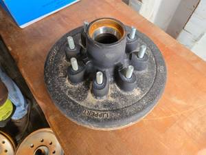 lot 47 image: New 12-inch Cast Iron Lippert Hub Assembly with 2.5-inch Hub Diameter