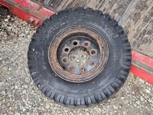lot 57 image: Used Forklift Tire 7.00-12 with Rim 12PR