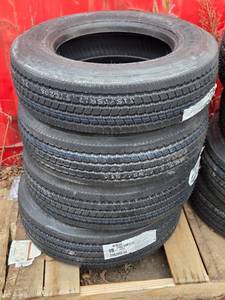 lot 63 image: Set of 4 New Aeolus 21575R17.5 Tires - 18 Ply HN235