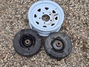lot 82 image: 12 Trailer Rim and 2 Tires - 4.103.50-4 Size