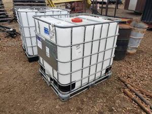 lot 113 image: Empty Bulk 250 Gallon IBC Tote Formerly Contained Canola Oil