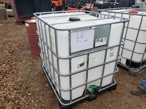 lot 114 image: Empty Bulk 250 Gallon IBC Tote Formerly Contained Canola Oil