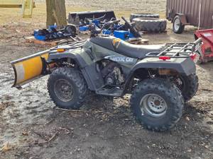 lot 1G image: Arctic Cat 400 ATV with Like New Winch and a Plow Attachment