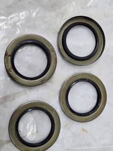 lot 237 image: Set of 4 Trailer Axel Seals (3 58 Outside Diameter, 2 14 Inside Diameter)