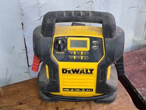 lot 294 image: Dewalt 1400 Peak Amp Jump Starter with Built-In Air Compressor