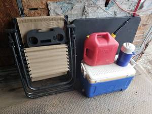 lot 332 image: Camping Chair Like New with Cup Holder, Cooler, and Gasoline Can