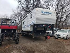 lot 1C image: The ULTIMATE Toy Hauler Adventure Trailer 2005 Sportsmen Travel Trailer Mounted on a 2015 34 Goose Neck Trailer - Personal Contents Not Included