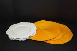 lot 58 image: White Charger Plates and Yellow Placemats