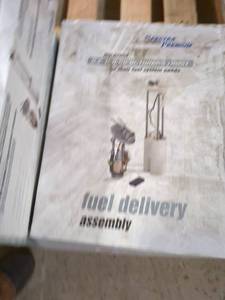 lot 124 image: Fuel Delivery Assembly - Set of 4 CarQuest Modules SP78B1H, SP2027M, SP4024M