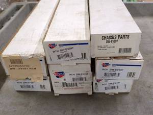 lot 129 image: Boxed Set of 5 Chassis Parts, RCH DWE397
