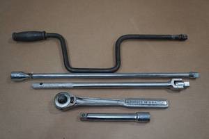 lot 153 image: Assorted 12 Drive Tools - Speeder, Breaker, Ratchet, Extensions