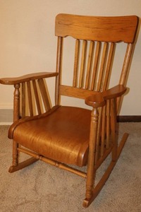 lot 17 image: Beautiful Antique Quarter-Sawn Oak Spindle Solid Oak Rocking Chair wAdditional Blue Upholstered Cushions
