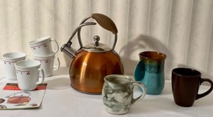 lot 132 image: Kitchen EssentialsWolfgang-Puck 2.2 Qt. Stainless Steel Tea Kettle wAssorted Pottery and China Coffee Cups