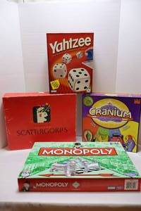 lot 98 image: Vintage Board Games...Yahtzee, Monopoly, Cranium, Scattergories