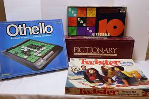 lot 97 image: Vintage Board Games...Othello, Tic-Tac-Toe, Twister, Pictionary