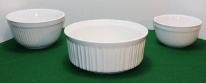 lot 146 image: Kitchen EssentialsTien Hsing Inc & CorningWare French White Ribbed Stoneware Serving Bowls