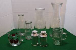 lot 157 image: Kitchen VintageHeritage Glass Milk Bottle, 1776-1976 Liberty AH Carafe, Green Glass Mug, Apple Creamer Pitcher, Tin S & P  Milk Cans Etc