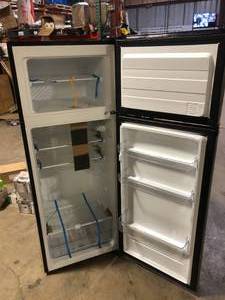 lot 6 image: Vissani 7.1 cu. ft. Top Freezer Refrigerator in Stainless Steel Look Customer Returns See Pictures