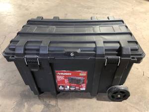 lot 41 image: Husky 23 in. 50 Gal. Black Rolling Toolbox with Keyed Lock and Portable Hand Tool Tray Customer Returns See Pictures