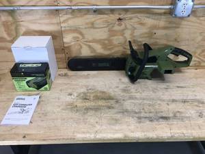 lot 21 image: Green Machine Cordless Chainsaw Model # GMCS6200