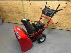 lot 29 image: TROY-BILT Model 31AS62N2711 Storm 2410 24 Gas Powered Snow Blower with Electric Start