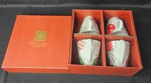 lot 65 image: Lenox Merry & Bright Set of 4 Holiday Mugs