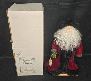 lot 105 image: Special Edition Santa Figure with Red Cape and Black Fur Trim