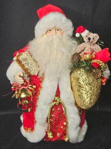 lot 107 image: Decorative Red and Gold Santa Claus Figurine Holding Gift Bag and Lantern