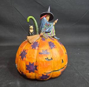 lot 122 image: Jim Shore Witch on Pumpkin Figurine - An Eerie Eve Awaits