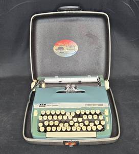lot 99 image: Vintage Smith-Corona Super Sterling Portable Typewriter with Case