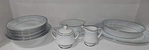 lot 101 image: Kenmark Fine China Dinnerware - Wisteria Pattern