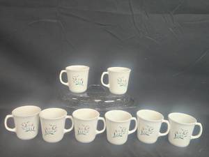 lot 169 image: Set of 10 Corning Coffee Mugs with Floral Design and 1 Black Speckled Roasting Pan