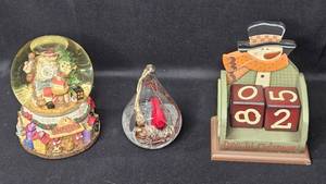 lot 145 image: Set of 3 Christmas Decorations Snow Globe, Cardinal Ornament, and Countdown Calendar