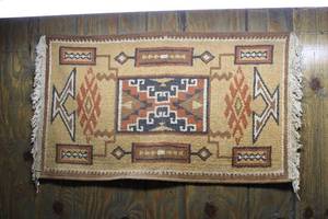 lot 12 image: Handwoven Southwestern Style Area Rug with Geometric Patterns