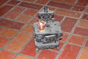 lot 17 image: Vintage Miniature Cast Iron Stove with Copper Accessories