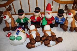 lot 21 image: Collection of 8 Holiday Plush Toys including Santa and Reindeer