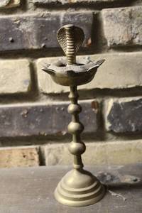 lot 24 image: Vintage Brass Candle Holder with Cobra Design