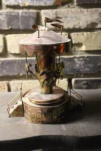 lot 28 image: Vintage Metal Carousel Music Box with Moving Horses