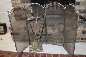 lot 38 image: Vintage Three-Panel Brass and Mesh Fireplace Screen Set with Tools