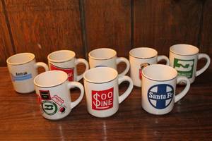 lot 52 image: Collection of 8 Vintage Railroad Logo Coffee Mugs