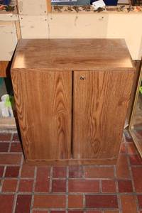lot 85 image: Vintage Wooden VHS Tape Storage Cabinet with Assorted Tapes