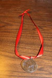lot 93 image: Vintage Minnesota Festival Medallion with Red Ribbon - 1992