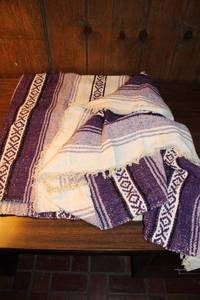 lot 99 image: Handwoven Purple and Cream Decorative Blanket with Unique Patterns